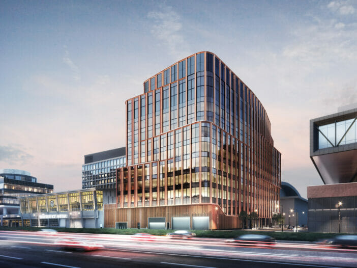 Architectural rendering of a modern building with copper tones, and engaging curves